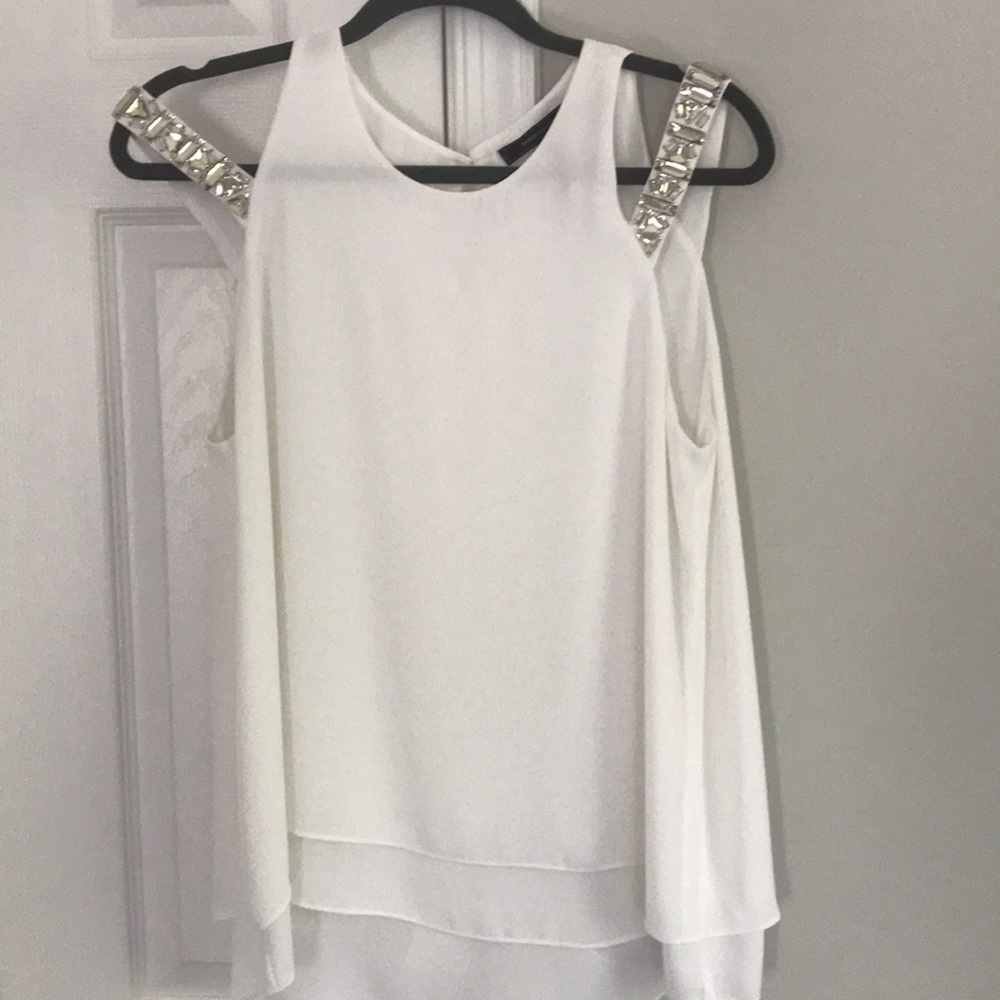 White silk top wgem embellished shoulder design